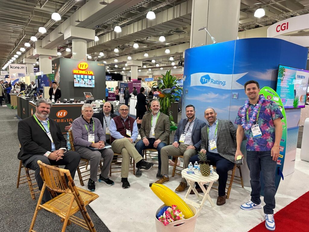 The team from Dollar Tree meeting visit the TruRating booth at NRF.